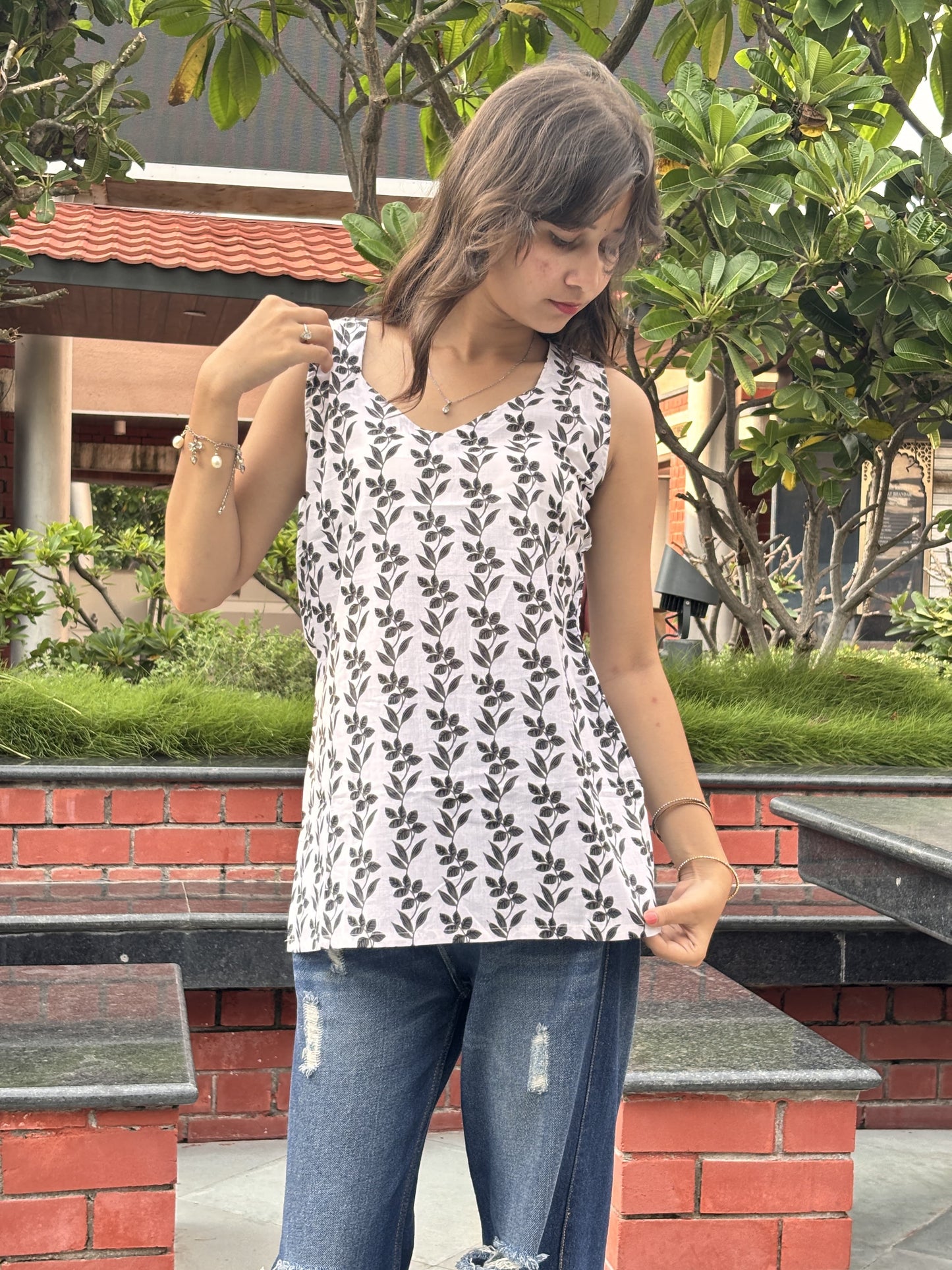 White Sleeveless Kurti with Black Leaf Print