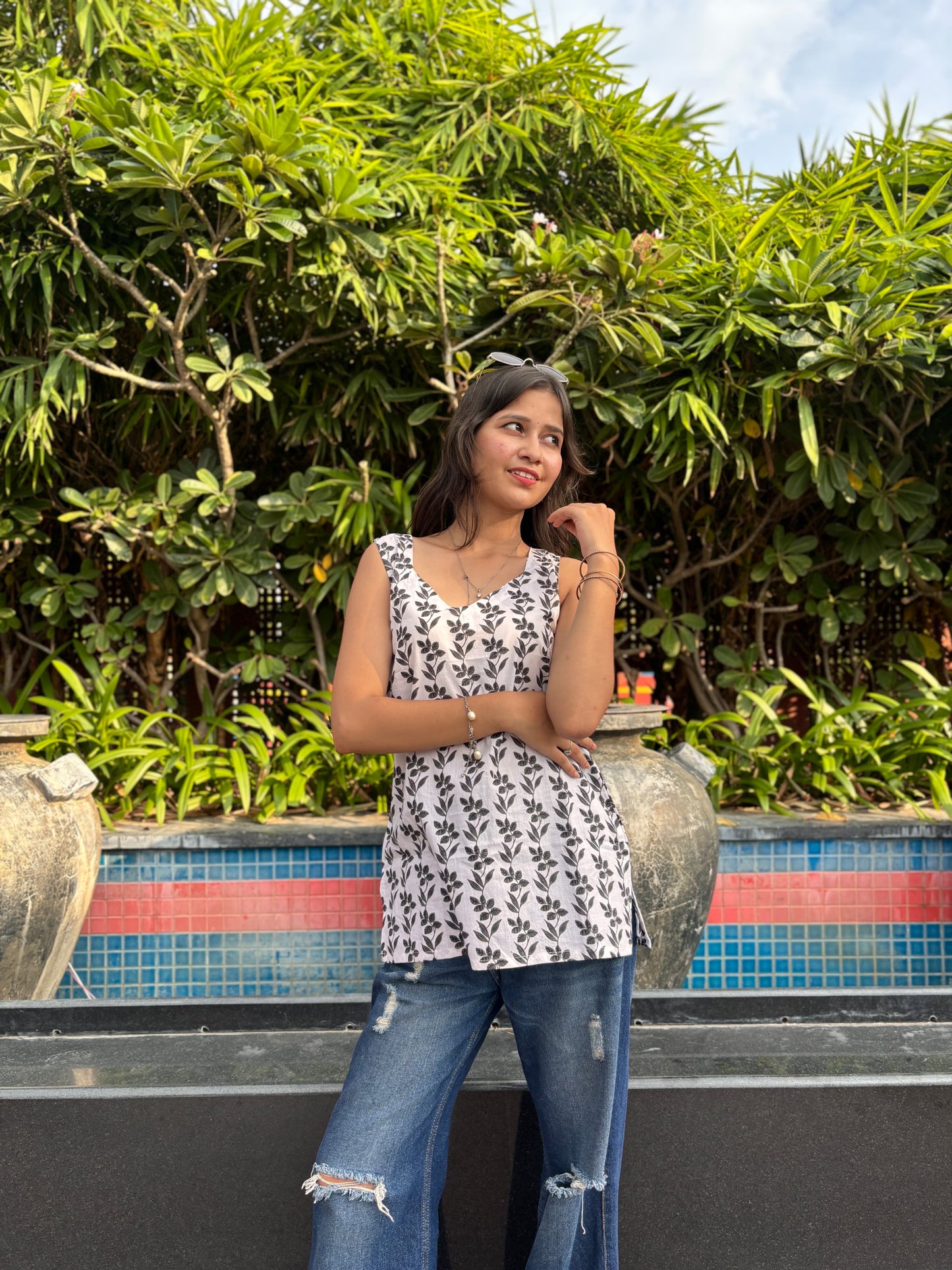 White Sleeveless Kurti with Black Leaf Print